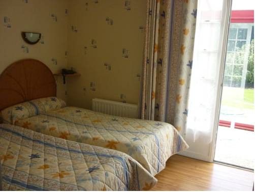 Imagen de la habitación del Hotel Le Relais De Beaucemaine. Foto 10