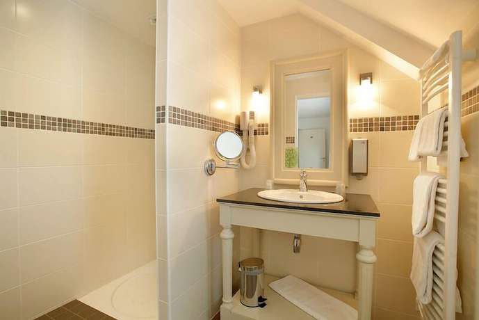 Imagen de la habitación del Hotel Le Relais De Broceliande. Foto 4