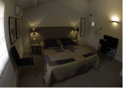 Imagen de la habitación del Hotel Le Relais De La Vignasse. Foto 6