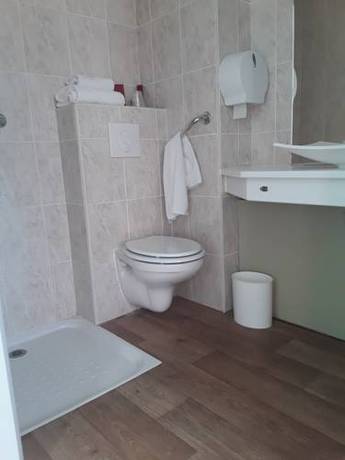 Imagen de la habitación del Hotel Le Relais De Voisins. Foto 2
