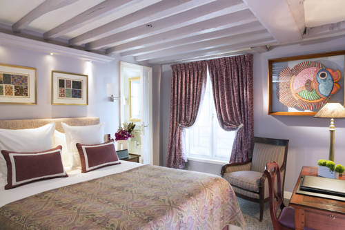 Imagen de la habitación del Hotel Le Relais Des Halles. Foto 10