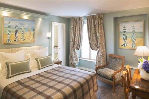 Imagen de la habitación del Hotel Le Relais Des Halles. Foto 16