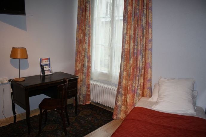 Imagen de la habitación del Hotel Le Relais Des Templiers. Foto 12