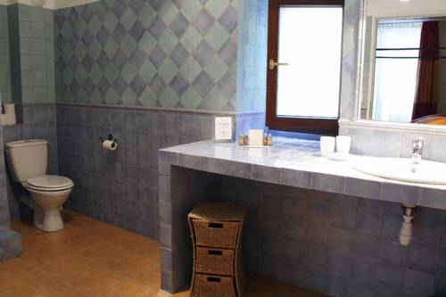 Imagen de la habitación del Hotel Le Relais Du Grand Logis. Foto 7