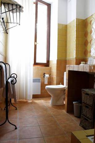 Imagen de la habitación del Hotel Le Relais Du Grand Logis. Foto 8