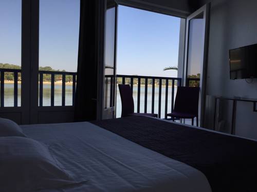 Imagen de la habitación del Hotel Le Relais Du Lac. Foto 9