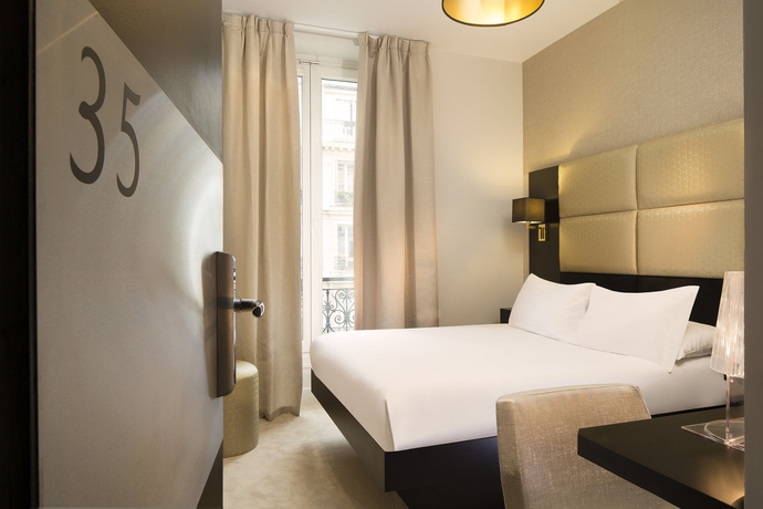 Imagen de la habitación del Hotel Le Relais Du Marais. Foto 1