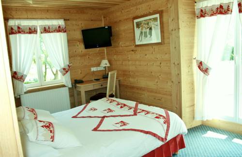 Imagen de la habitación del Hotel Le Relais Du Mont Blanc. Foto 9