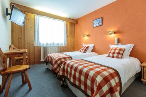 Imagen de la habitación del Hotel Le Relais Du Petit Saint Bernard. Foto 5