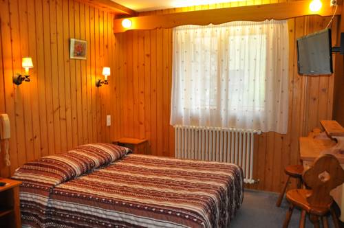 Imagen de la habitación del Hotel Le Relais Du Petit Saint Bernard. Foto 7