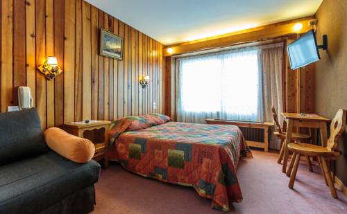 Imagen de la habitación del Hotel Le Relais Du Petit Saint Bernard. Foto 8