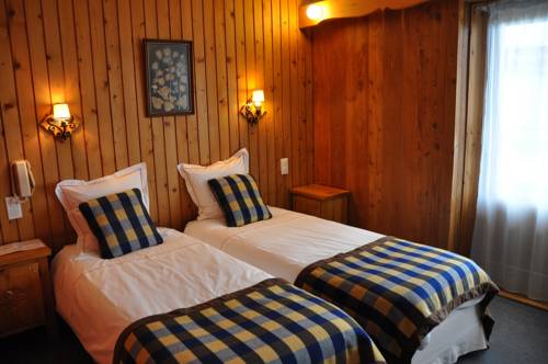 Imagen de la habitación del Hotel Le Relais Du Petit Saint Bernard. Foto 15
