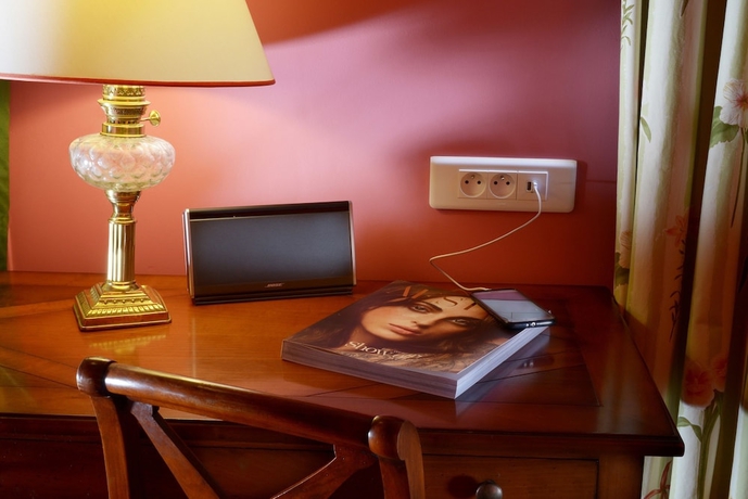 Imagen de la habitación del Hotel Le Relais Montmartre. Foto 7