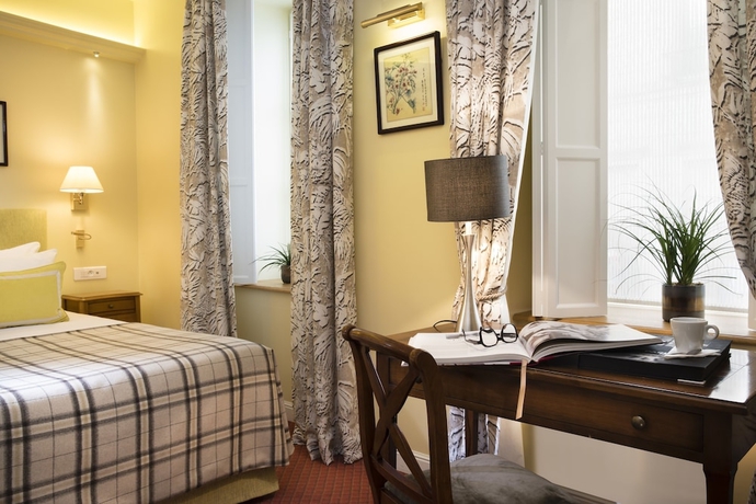 Imagen de la habitación del Hotel Le Relais Montmartre. Foto 11