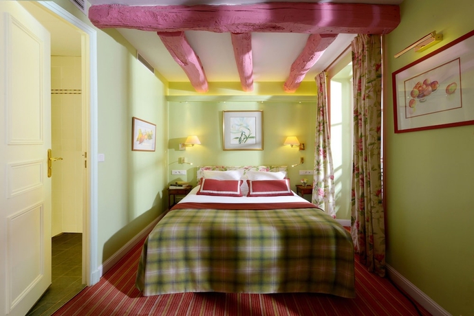 Imagen de la habitación del Hotel Le Relais Montmartre. Foto 12