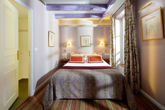 Imagen de la habitación del Hotel Le Relais Montmartre. Foto 13