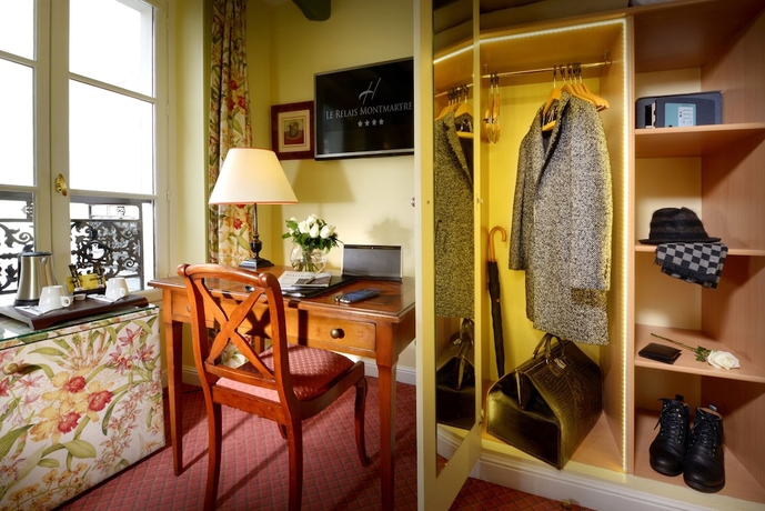 Imagen de la habitación del Hotel Le Relais Montmartre. Foto 16