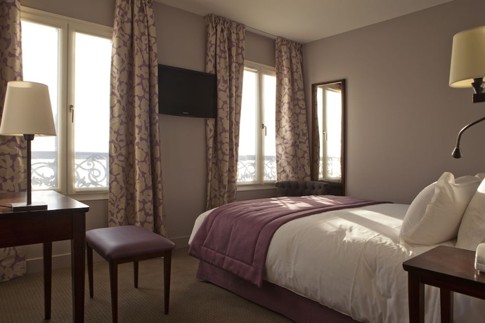 Imagen de la habitación del Hotel Le Relais Saint Charles. Foto 8