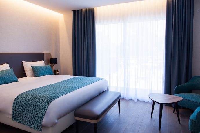 Imagen de la habitación del Hotel Le Relais Saint Jacques, Coings. Foto 4