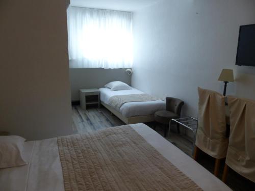 Imagen de la habitación del Hotel Le Relais des Iles. Foto 8