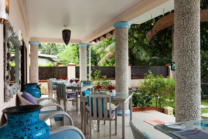 Imagen del bar/restaurante del Hotel Le Relax Beach House - La Digue. Foto 4
