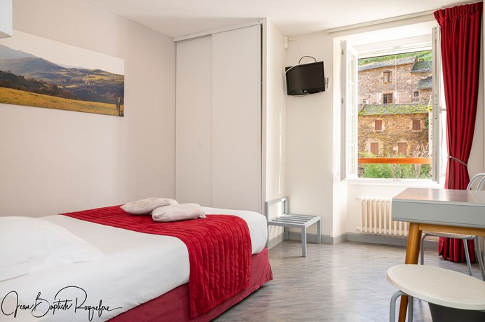 Imagen de la habitación del Hotel Le Relays du Chasteau. Foto 9