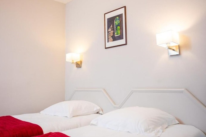 Imagen de la habitación del Hotel Le Relays du Chasteau. Foto 19