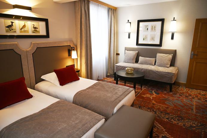 Imagen de la habitación del Hotel Le Rempart. Foto 11
