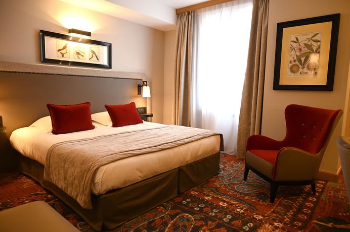 Imagen de la habitación del Hotel Le Rempart. Foto 13