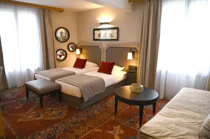 Imagen de la habitación del Hotel Le Rempart. Foto 17