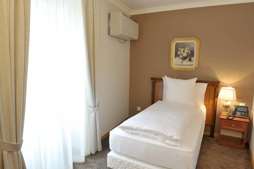 Imagen de la habitación del Hotel Le Rive. Foto 15