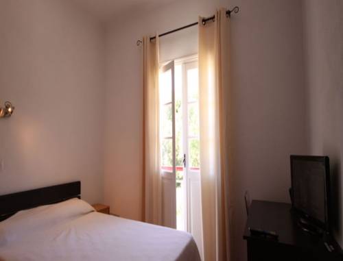 Imagen de la habitación del Hotel Le Riviera. Foto 8