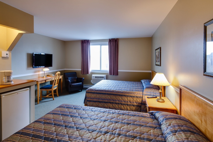 Imagen de la habitación del Hotel Le Roberval. Foto 8