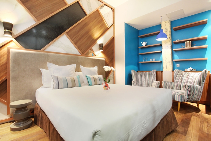 Imagen de la habitación del Hotel Le Robinet d'Or. Foto 4