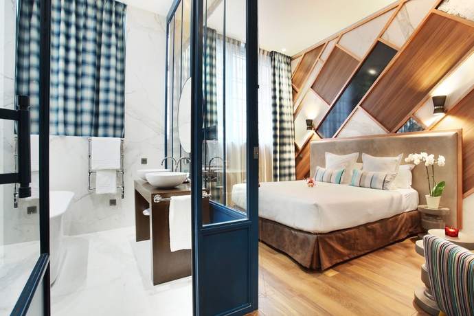 Imagen de la habitación del Hotel Le Robinet d'Or. Foto 5