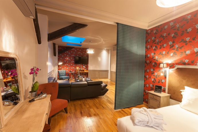 Imagen de la habitación del Hotel Le Robinet d'Or. Foto 8