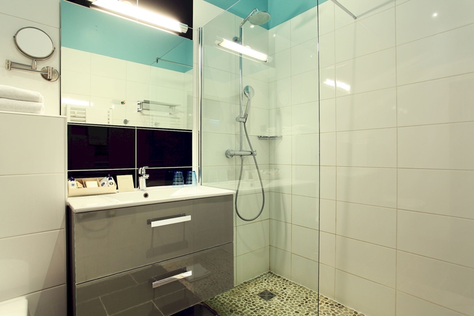 Imagen de la habitación del Hotel Le Robinet d'Or. Foto 9