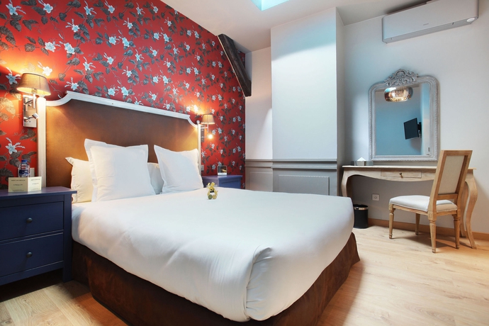 Imagen de la habitación del Hotel Le Robinet d'Or. Foto 10