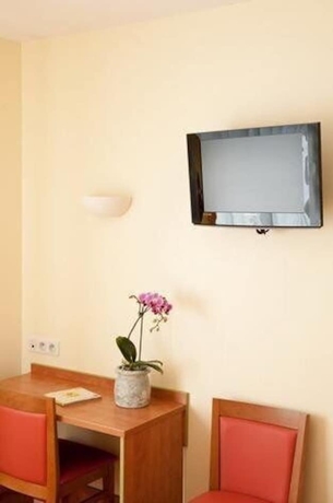 Imagen de la habitación del Hotel Le Robinson. Foto 9