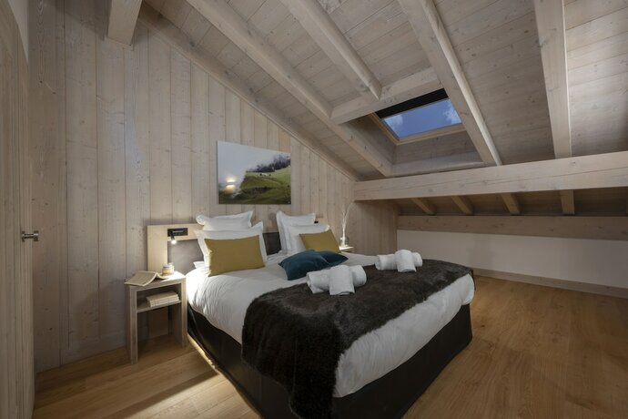 Imagen de la habitación del Hotel Le Roc des Tours, Le Grand-Bornand. Foto 15