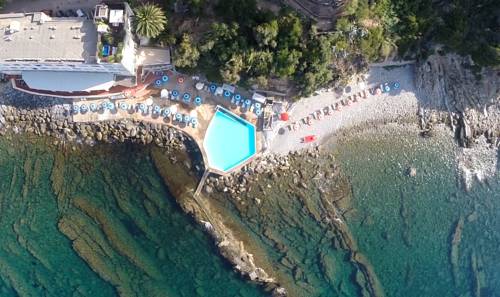 Imagen de la habitación del Hotel Le Rocce Del Capo. Foto 2