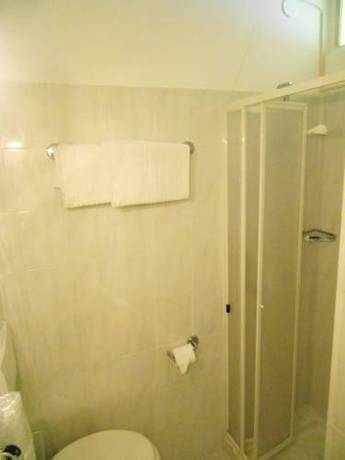 Imagen de la habitación del Hotel Le Rocce Del Capo. Foto 3