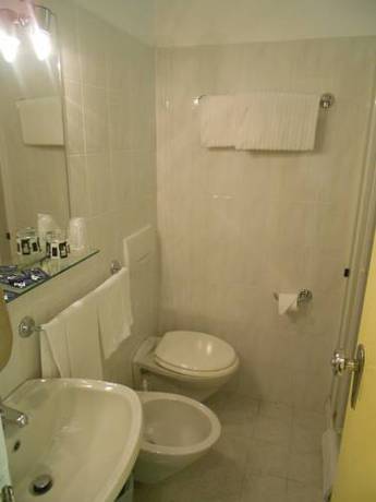 Imagen de la habitación del Hotel Le Rocce Del Capo. Foto 4