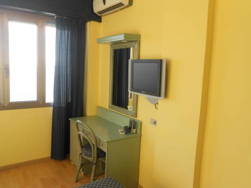 Imagen de la habitación del Hotel Le Rocce Del Capo. Foto 5
