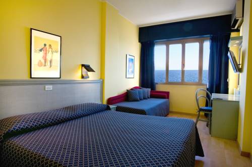 Imagen de la habitación del Hotel Le Rocce Del Capo. Foto 7
