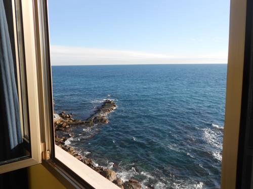 Imagen de la habitación del Hotel Le Rocce Del Capo. Foto 9