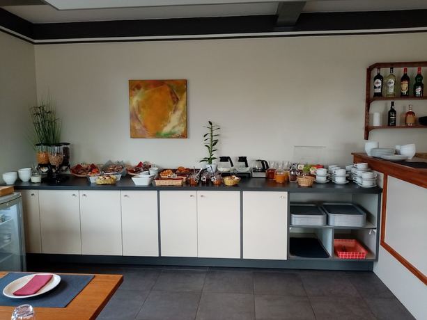 Imagen del bar/restaurante del Hotel Le Rocher Des Marais. Foto 5