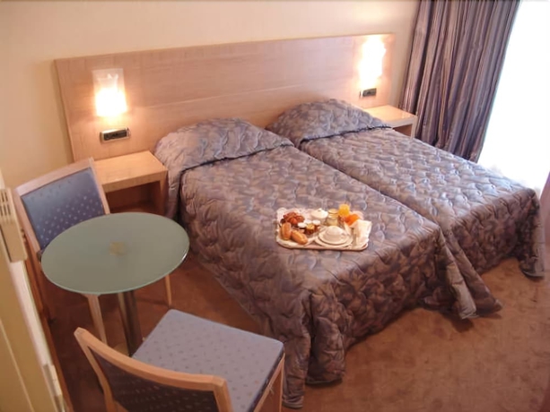 Imagen de la habitación del Hotel Le Rocher. Foto 8