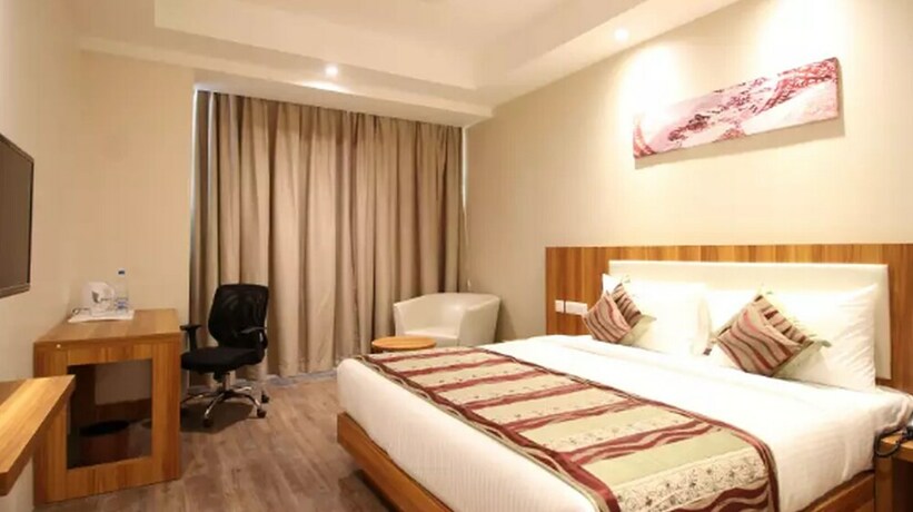 Imagen de la habitación del Hotel Le Roi Raipur. Foto 26