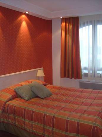 Imagen de la habitación del Hotel Le Roma. Foto 10